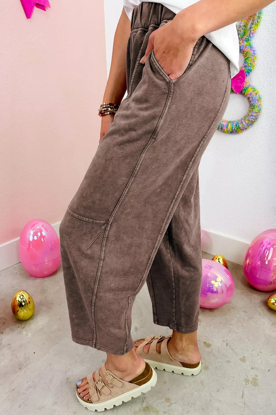 Brown mineral wash cropped sweatpants with pockets and seam detail.