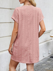 Dusty Pink eyelet mini dress with diamond pattern, crew neck, and short sleeves.