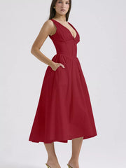 Deep Red V-neck midi dress with a-line skirt and pockets.
