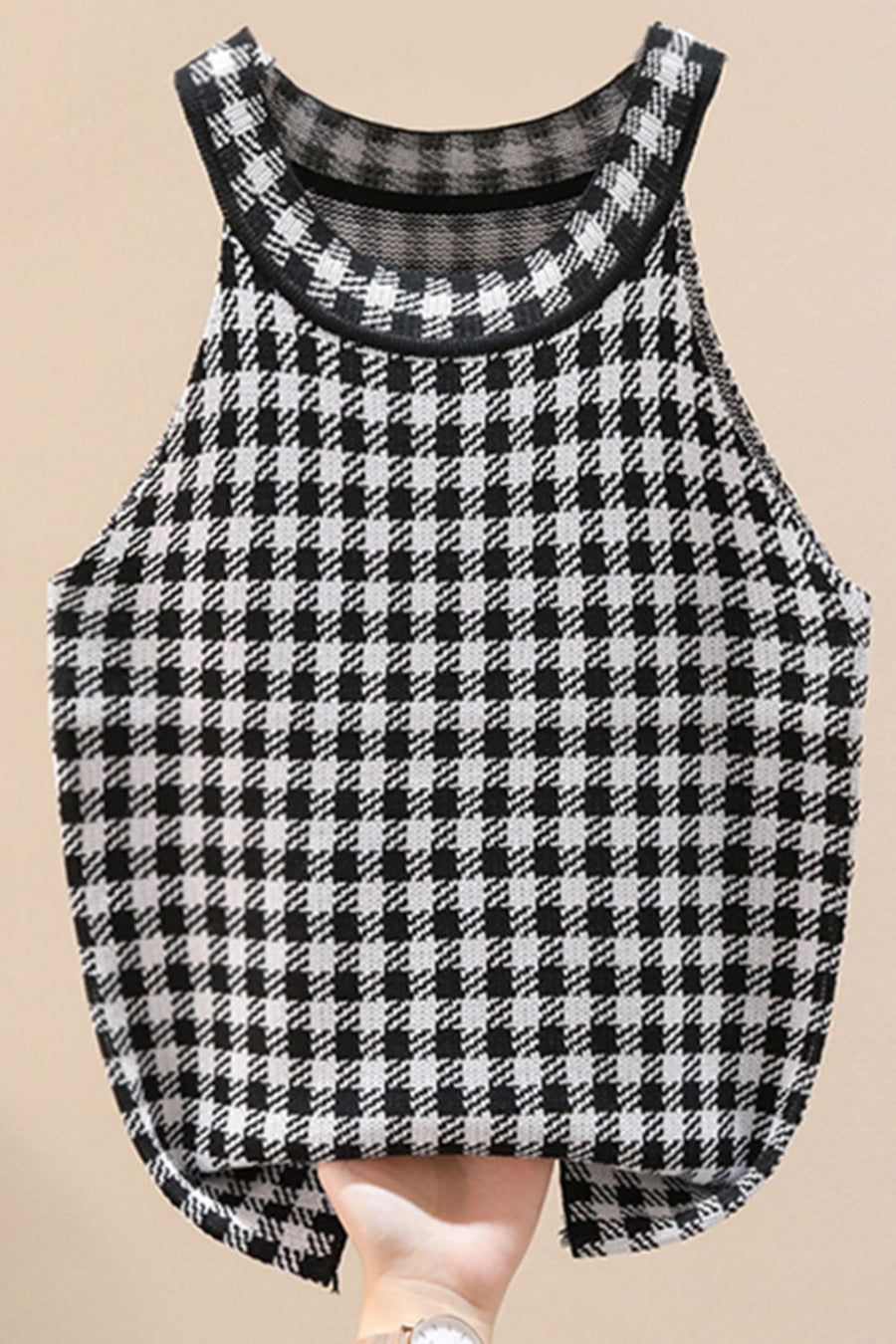 Houndstooth knit halter tank top in black and white acrylic with a scoop neckline.