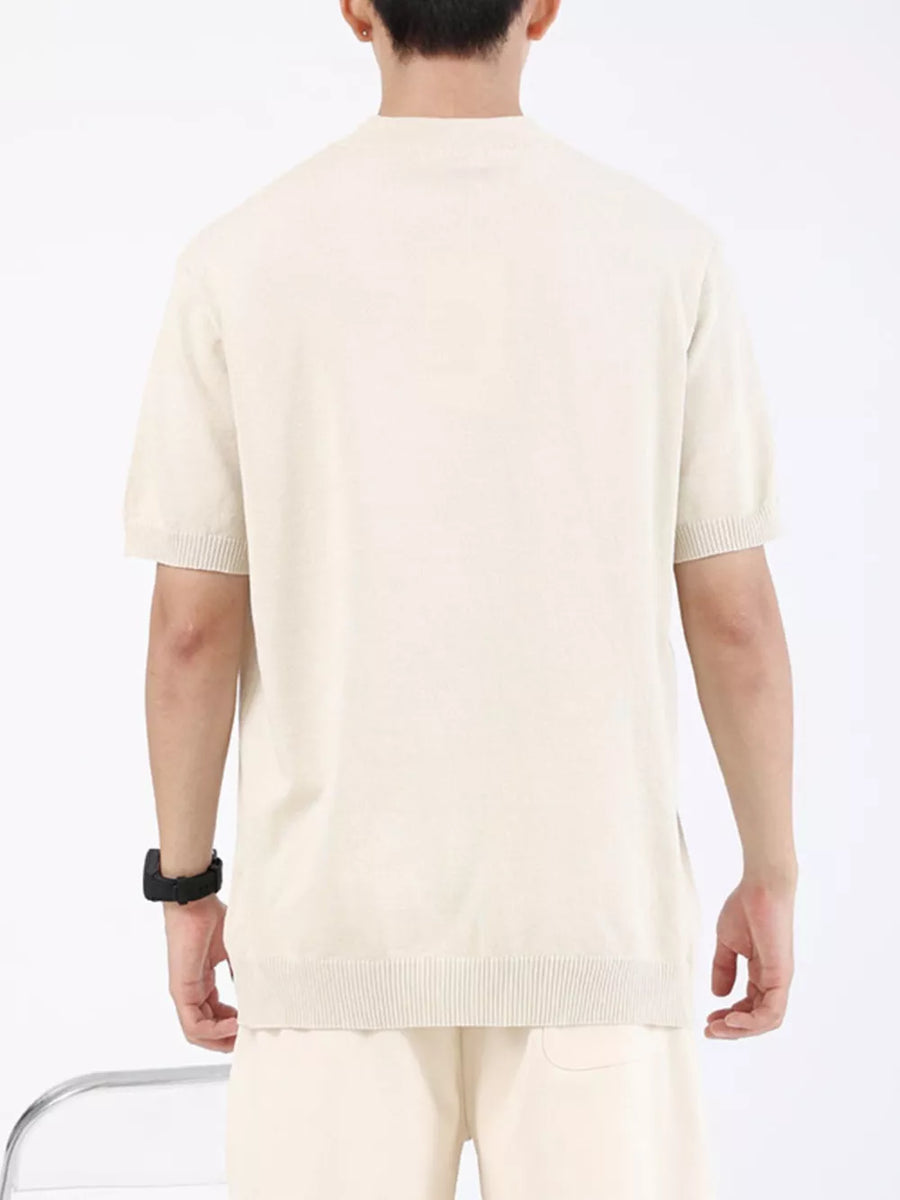 Men's apricot knit t-shirt with mock neck and short sleeves.