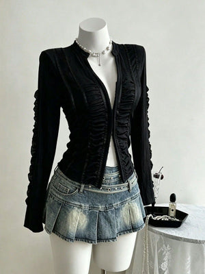 blouse in black featuring ruched and slim fit