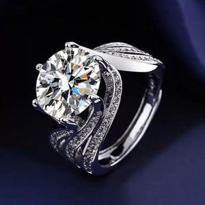 Exquisite 5ct moissanite solitaire ring in silver with brilliant cut stone and pavé band.