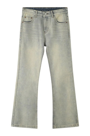 Relaxed flare denim trousers in light blue wash with a subtle vintage fade.