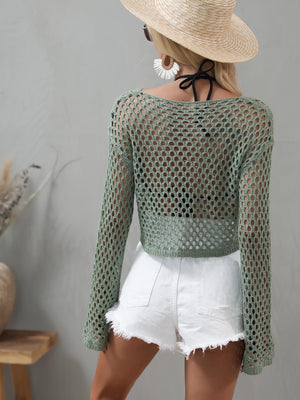 Green open-knit acrylic crop sweater with bell sleeves and a wide neckline.