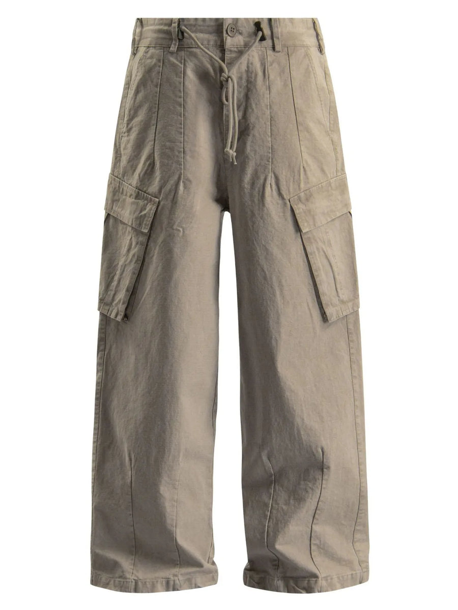 Relaxed fit khaki cargo pants with drawstring waist and large side pockets.