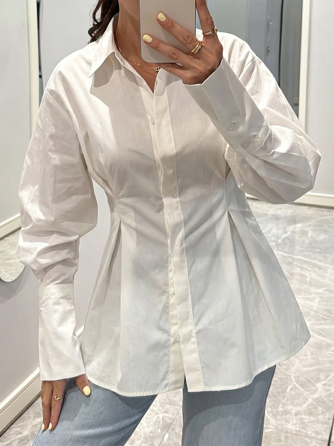 button-down shirt in white featuring button cuffs and fitted fit