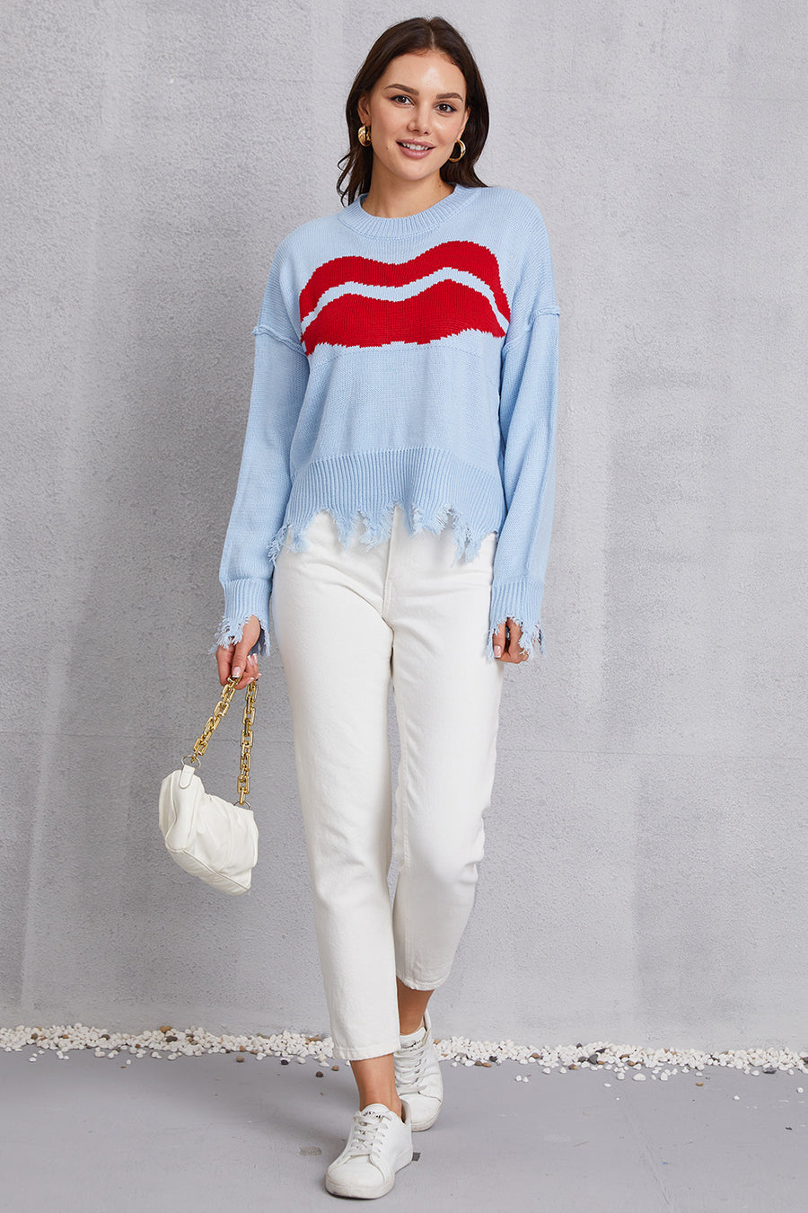 Light Blue Kiss Graphic Distressed Hem Sweater with red lips pattern, acrylic knit, crew neck, long sleeves, and frayed hem.