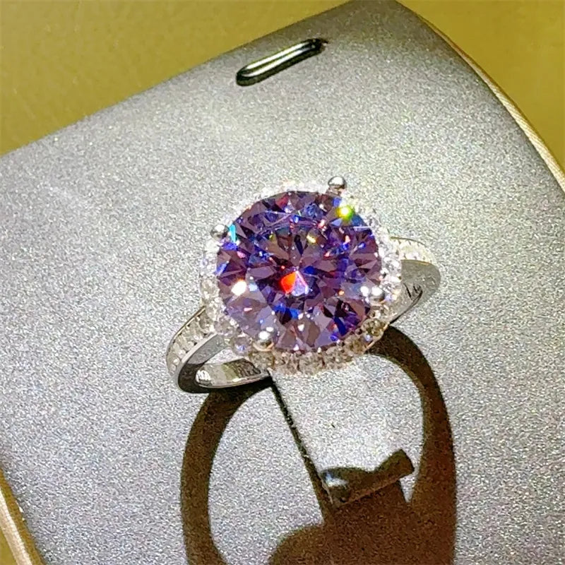 Violet halo sterling silver ring with large purple center stone and diamond band.