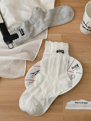 White socks with pullover and geometric