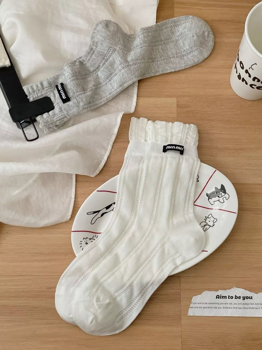 White socks with pullover and geometric