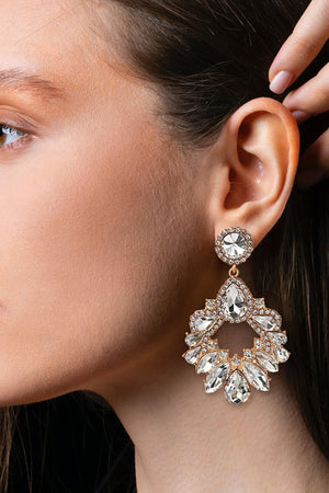 Jeweled chandelier drop earrings with clear crystals and gold alloy setting.