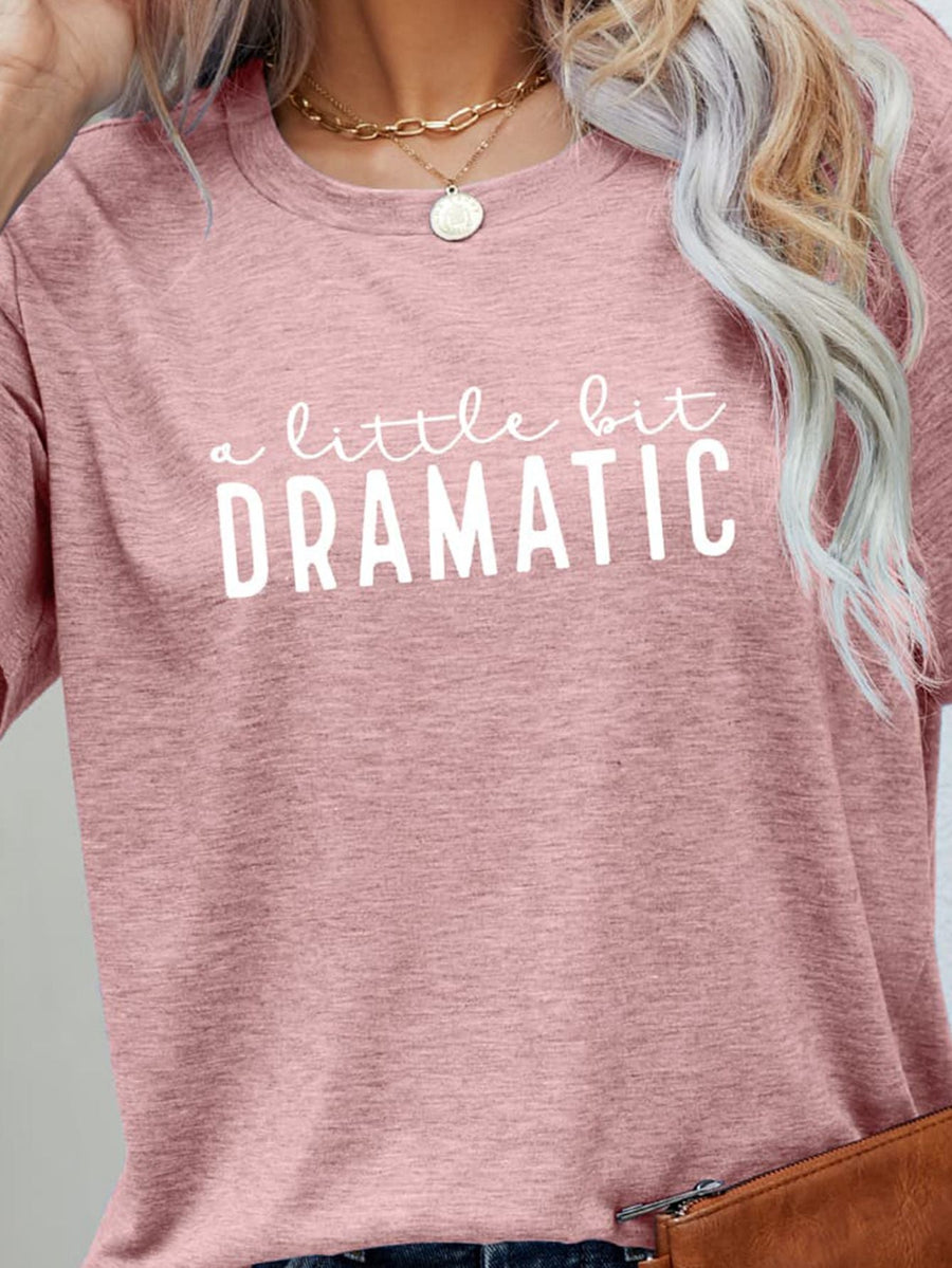 Blush pink crew neck tee with white text graphic a little bit DRAMATIC