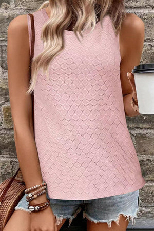 Textured sleeveless scoop neck top in blush pink with allover eyelet pattern.