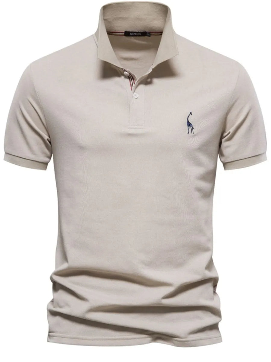 Khaki piqué polo shirt with giraffe embroidery and striped collar detail.