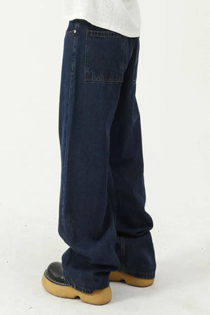 Baggy dark wash denim jeans with a wide leg silhouette and square back pockets.