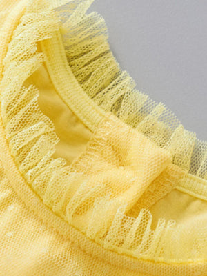 Yellow toddler dress with ruffled tulle neckline and cotton spandex lining.