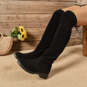 Black suede over-the-knee boots with tie-back detail