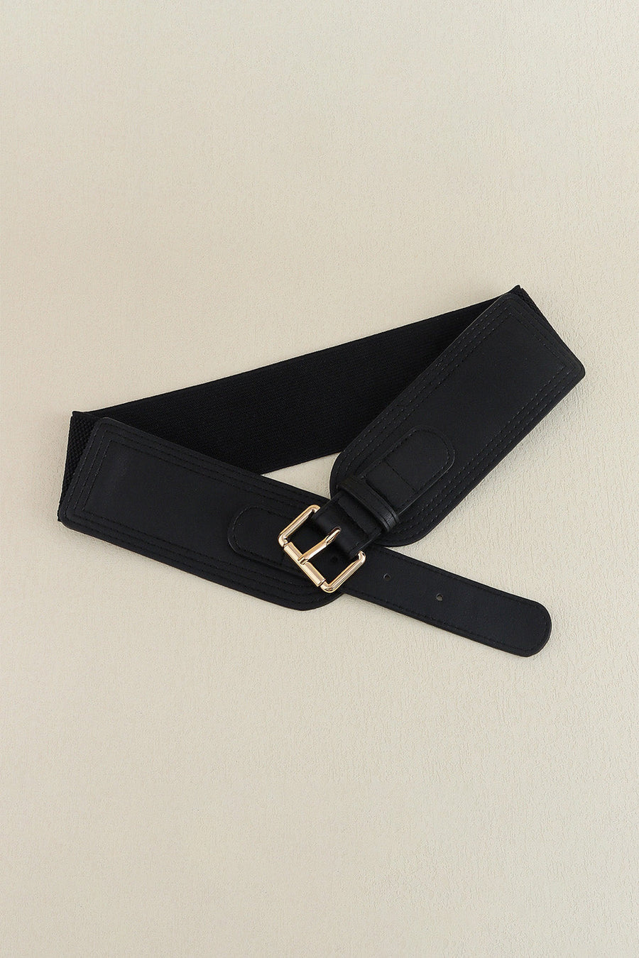 Black elasticated waist belt with faux leather front and gold buckle
