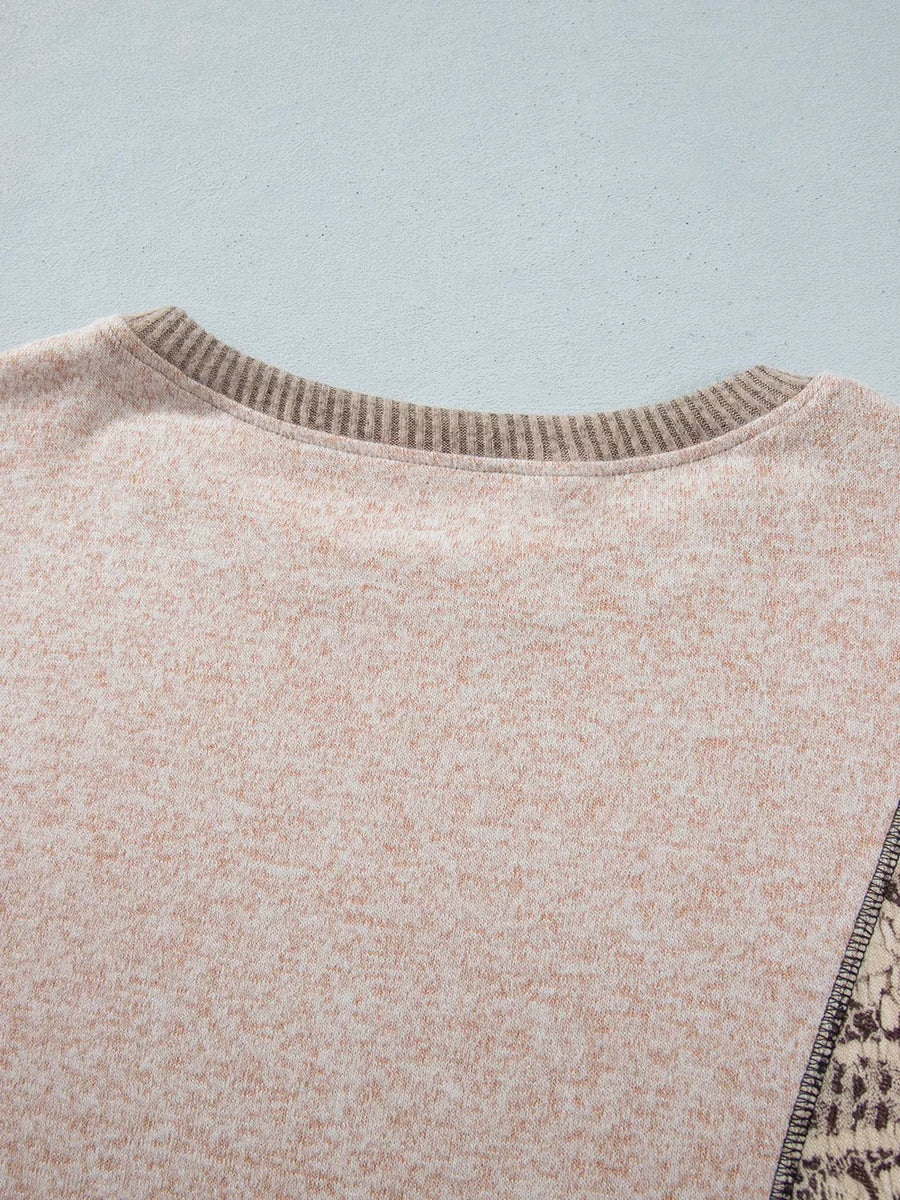 dark brown blouse with ribbed hem and long sleeve