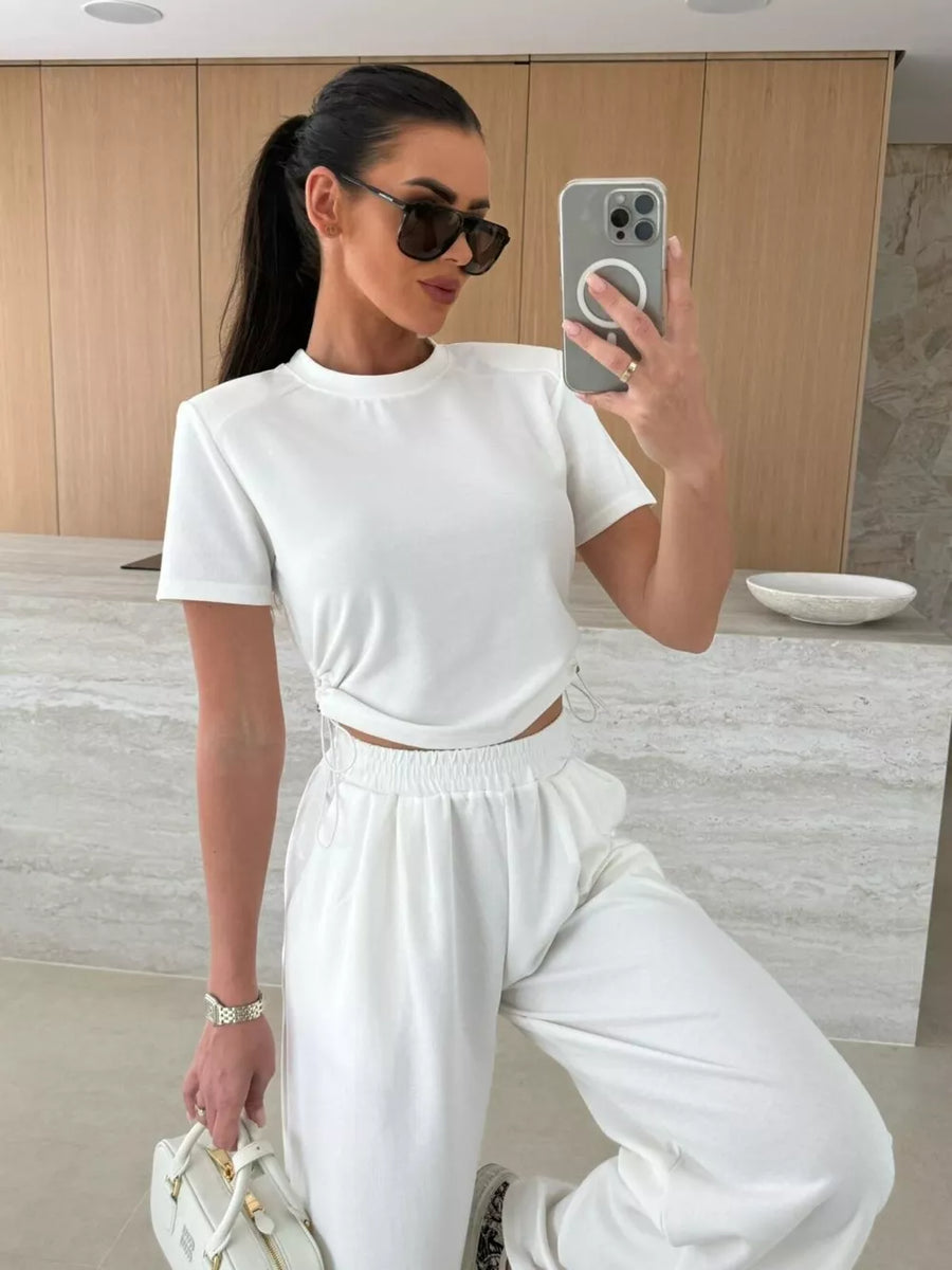 White crop top and wide-leg pants set with adjustable drawstring details