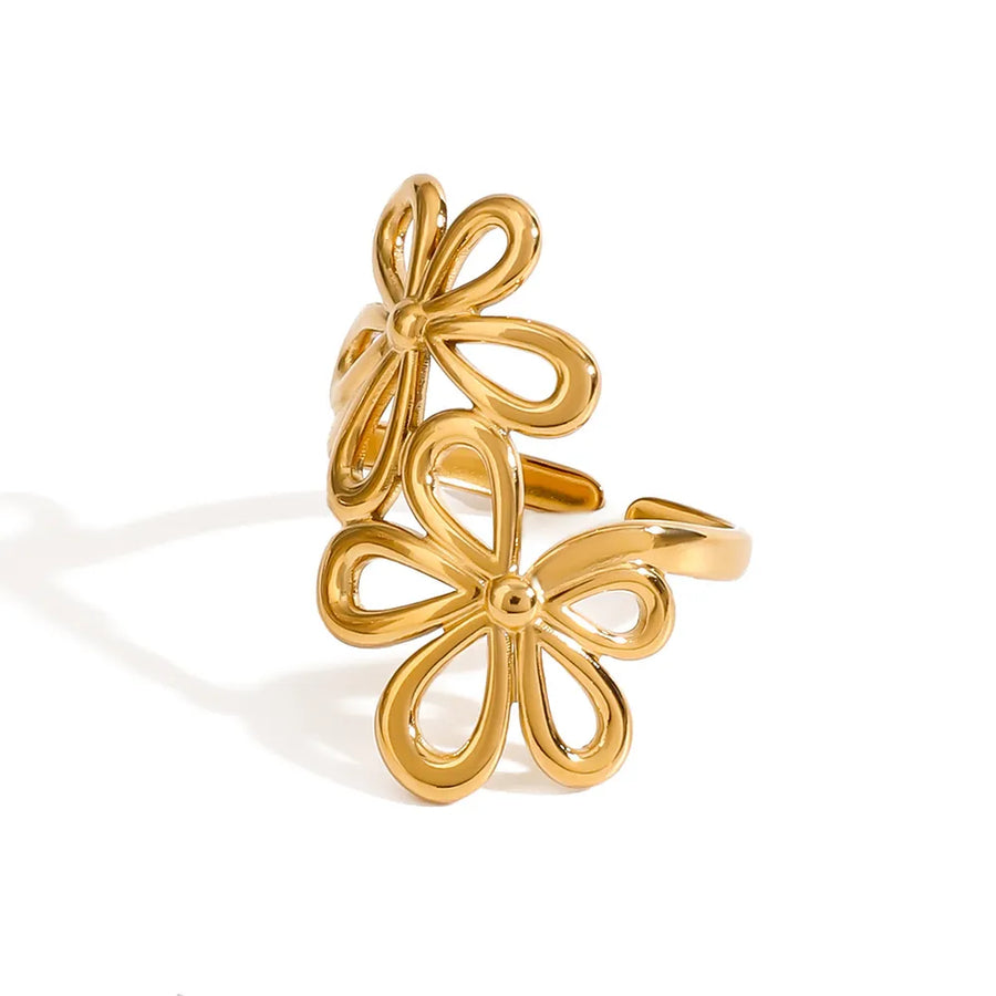 ring in gold with floral and double bloom design