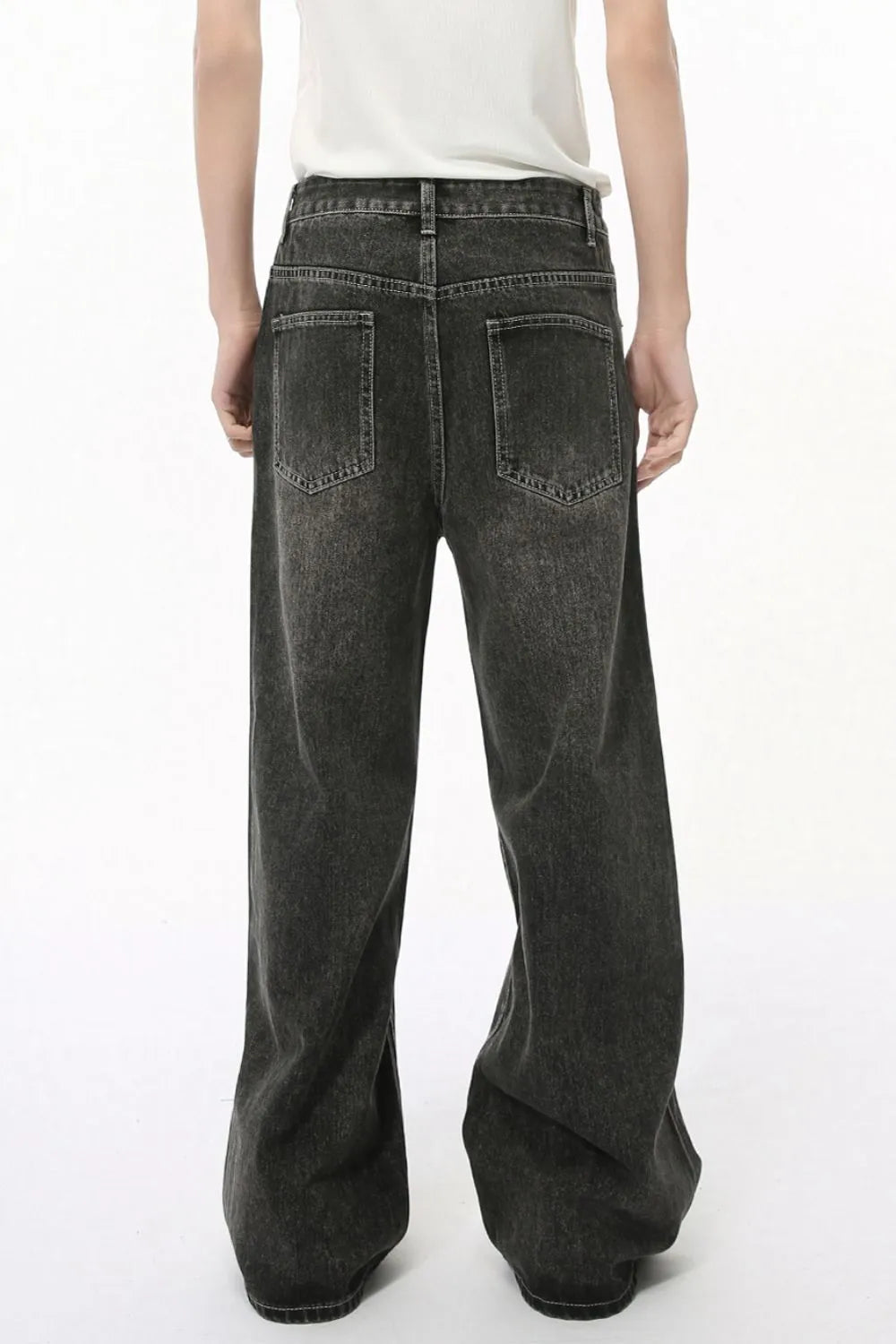 Faded wash dark palazzo jeans with a wide leg and classic back pockets.