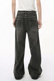 Faded wash dark palazzo jeans with a wide leg and classic back pockets.