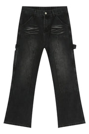Carpenter jeans in washed black denim with relaxed fit and utility pockets.