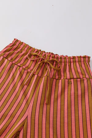 Wide leg pants in pink and brown stripes with drawstring waist and button pocket detail.