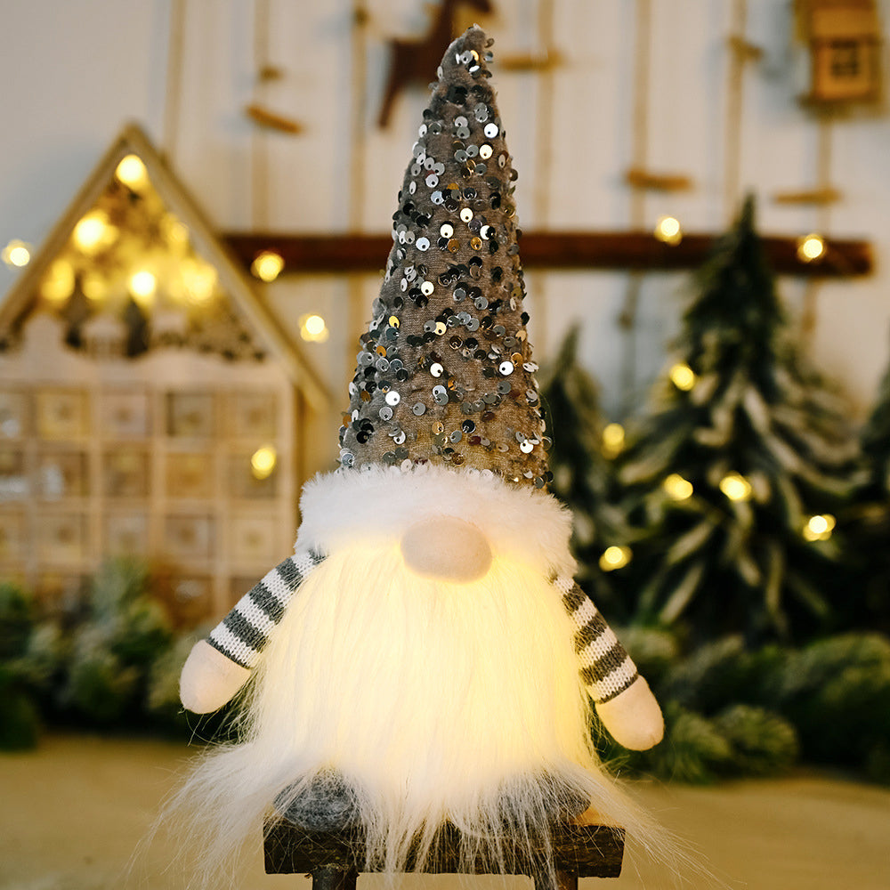 Light-up sequin gnome with striped sleeves and glowing beard, holiday decor