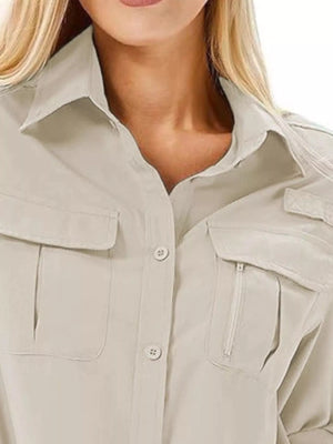 Light gray button-up shirt with chest pockets and roll-up sleeves.