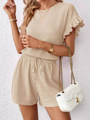 Beige frill sleeve tee and drawstring shorts set with textured fabric.