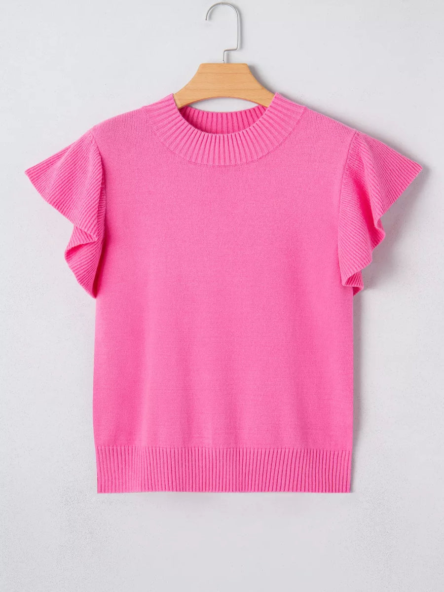 Pink knit top with ruffled short sleeves and ribbed mock neckline.