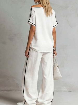 100% polyester Care instructions: Machine wash cold lounge set in ivory with relaxed silhouette