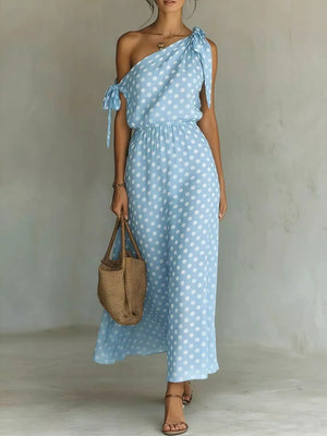 Blue polka dot one-shoulder maxi dress with tie details and elastic waist