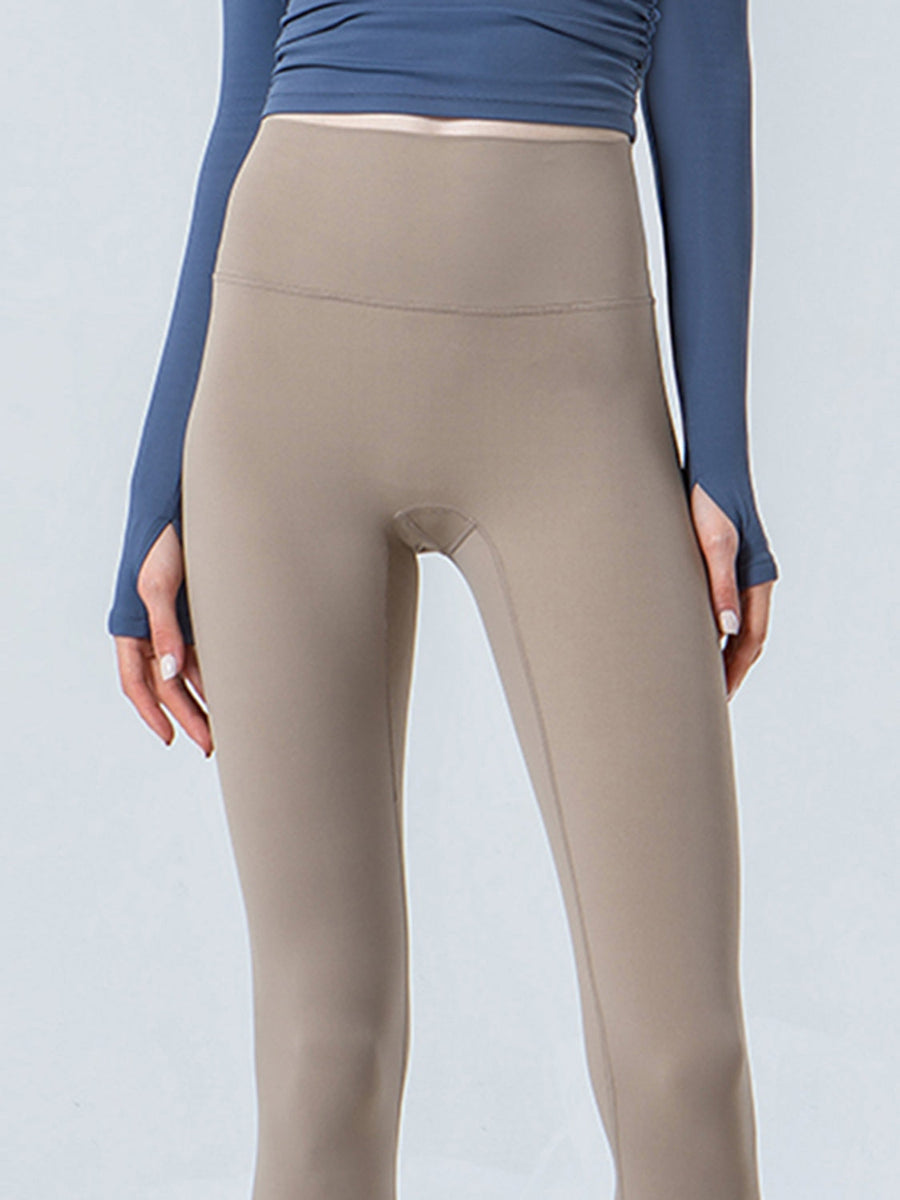 Beige sculpted crop leggings with a high waistband and subtle seam details.