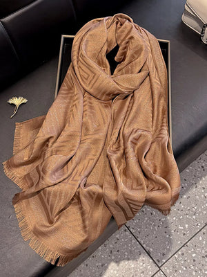 Elegant Tencel cotton scarf in coffee with geometric pattern and fringe detail.