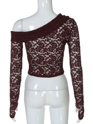 Sheer lace one-shoulder top in burgundy with long sleeves and floral pattern.