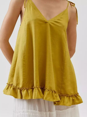 Yellow camisole with tie straps and ruffled hem