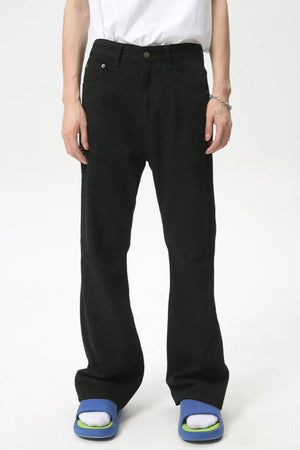 Wide-leg black denim trousers with a casual fit.