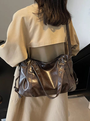 Large vintage brown PU leather shoulder bag with top handles and a crossbody strap.