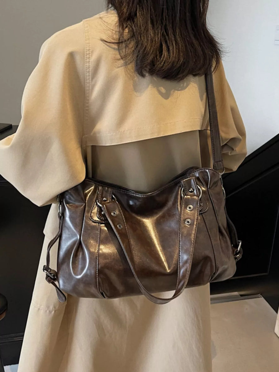 Large vintage brown PU leather shoulder bag with top handles and a crossbody strap.