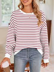 white sweatshirt with ribbed cuffs and long sleeve