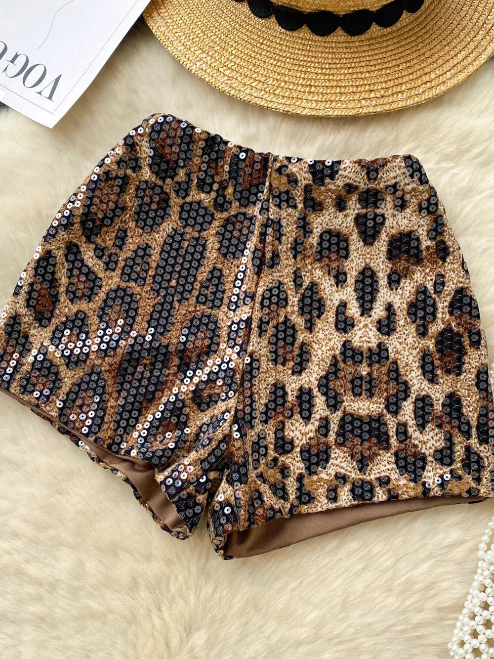 Sequin animal print chino shorts with a comfortable fit.