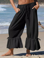 wide-leg pants in Black with tied and cropped