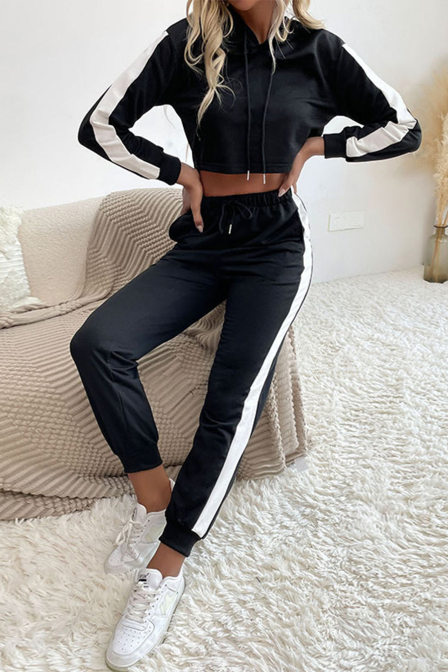 Black cropped tracksuit with white stripe details on sleeves and pants