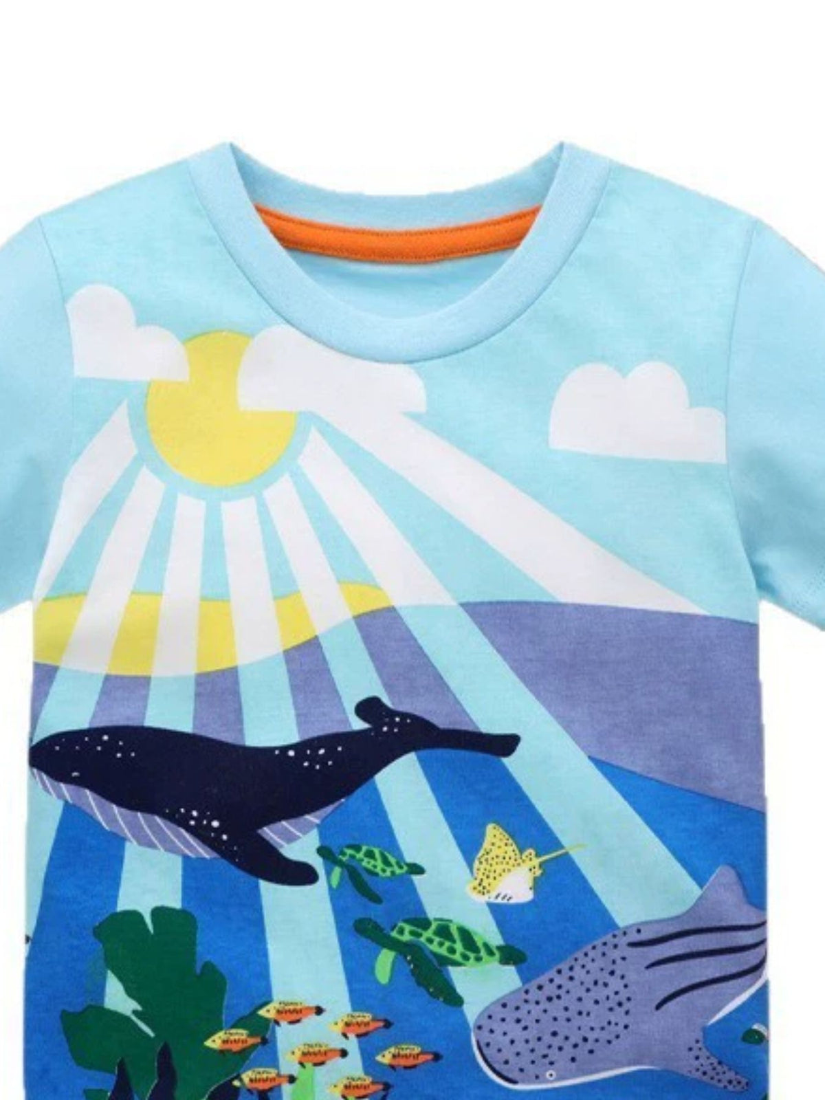 Pastel blue crew neck t-shirt with an underwater scene featuring whales, turtles, and fish.