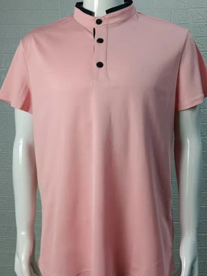 Men's dusty pink acrylic polo shirt with contrast collar and black buttons.