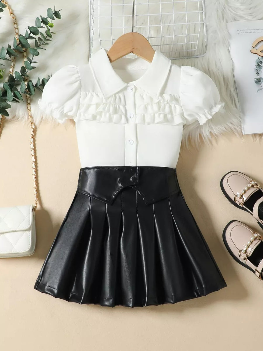 White puff sleeve ruffle top and black pleated faux leather skirt set for baby girls.